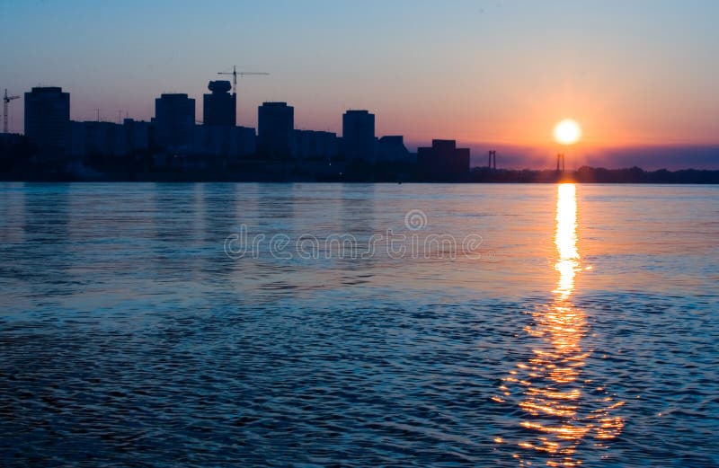 City on the river in sunrise