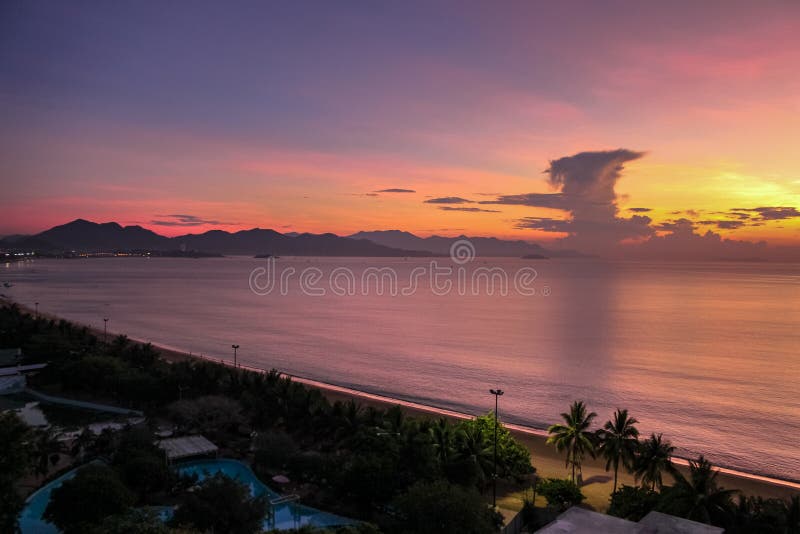 City Seascape with Aerial View of Nha Trang Beach, Mountains and Bay at Breaking Dawn royalty free stock images City Seascape with Aerial View of Nha Trang Beach, Mountains and Bay at Breaking Dawn royalty free stock images
