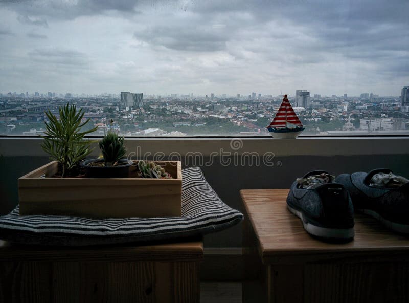 City view from window of an apartment.