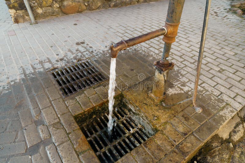 City water pump with running drink water for people stock photos City water pump with running drink water for people stock photos