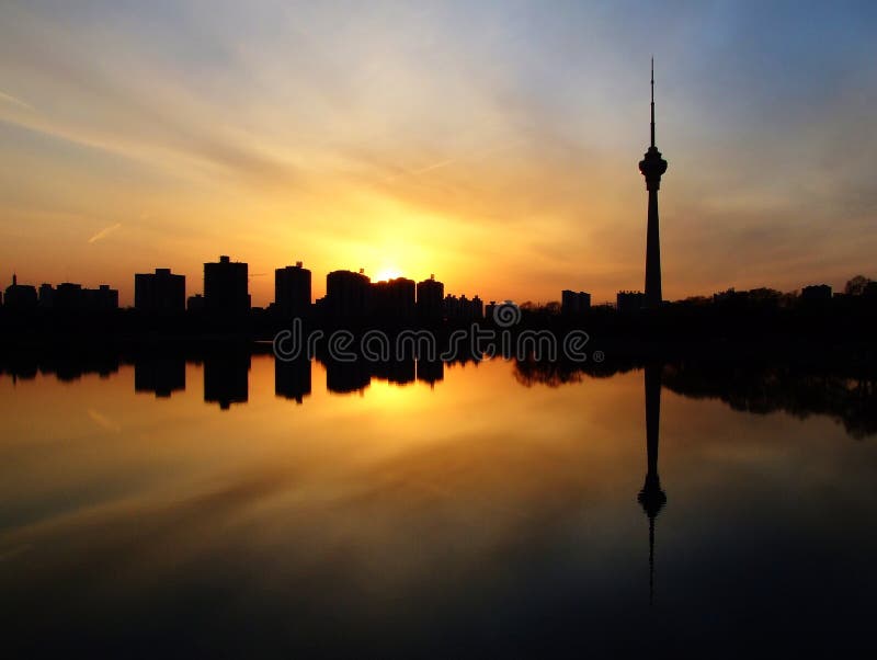 cityscape of cctv tower at sunset