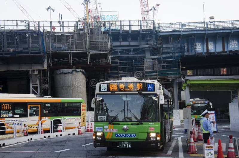 Cityscape and japanese people drive bus on traffic road and stop royalty free stock images Cityscape and japanese people drive bus on traffic road and stop royalty free stock images