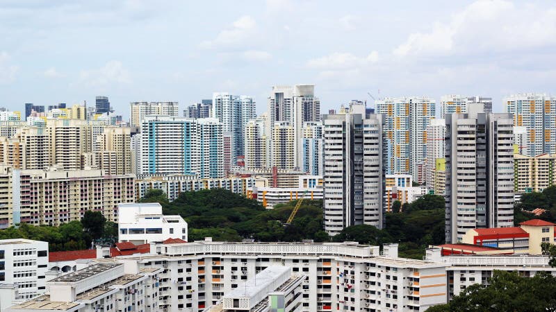 Cityscape of Many modern tall skyscraper condominiums, apartments, with houses in foreground. Buildings, Singapore, city area. stock images Cityscape of Many modern tall skyscraper condominiums, apartments, with houses in foreground. Buildings, Singapore, city area. stock images