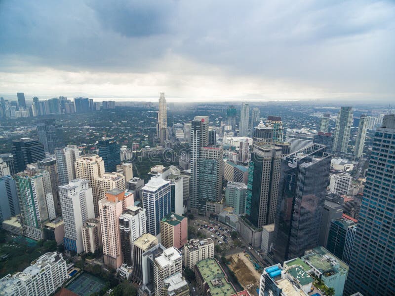 Cityscape van Manilla, Makati-Stad met Bedrijfsgebouwen en Bewolkte Hemel filippijnen Wolkenkrabbers op achtergrond stock foto's Cityscape van Manilla, Makati-Stad met Bedrijfsgebouwen en Bewolkte Hemel filippijnen Wolkenkrabbers op achtergrond stock foto's