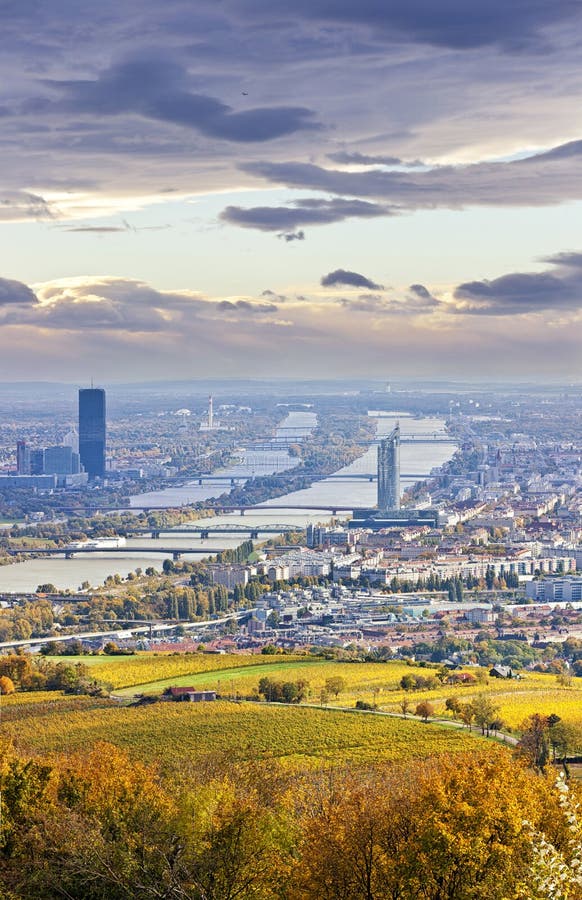 Cityscape of Vienna and Danube in the autumn at dusk stock photos