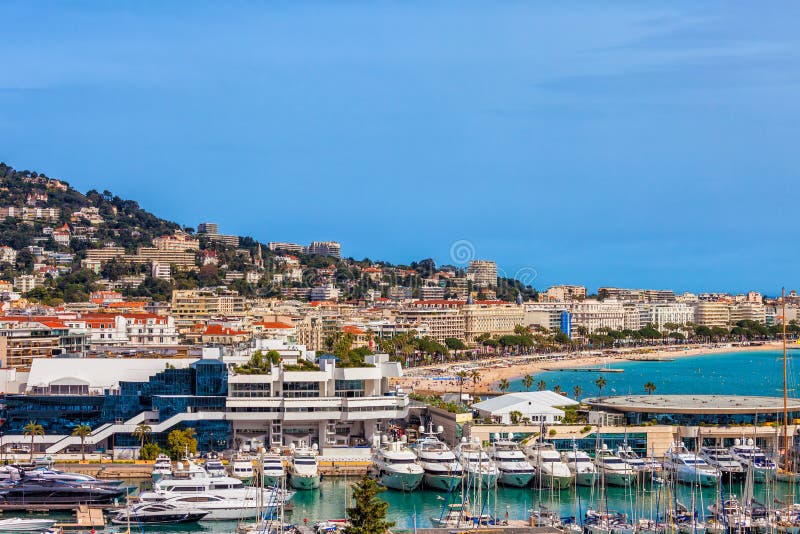 City of Cannes in France, skyline view over Le Vieux Port and Palais des Festivals on French Riviera. City of Cannes in France, skyline view over Le Vieux Port and Palais des Festivals on French Riviera