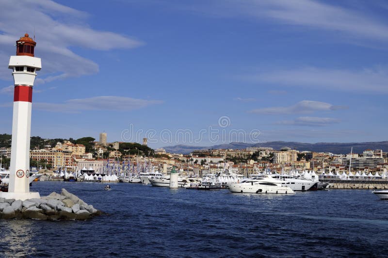 The city and the harbor of Cannes in the French riviera. The city and the harbor of Cannes in the French riviera.