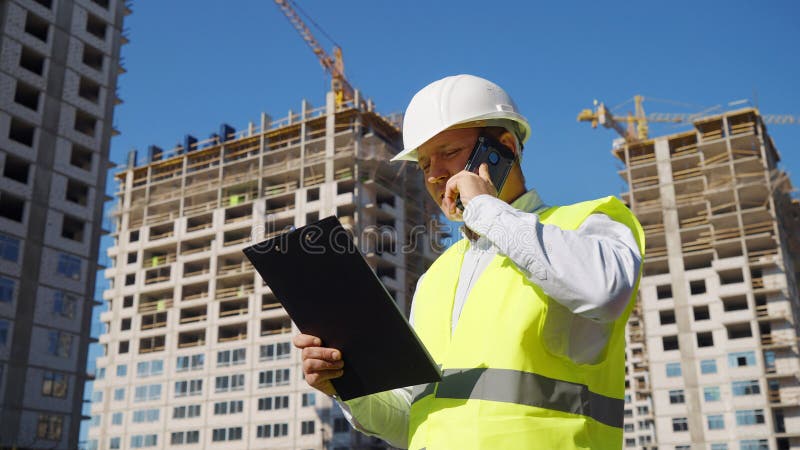 Civil Engineer Doing Inspection on Construction Site Stock Photo ...