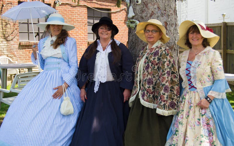 Buchanan, VA - April 26; Ladies in dressed in Civil War period clothing at the Buchanan Civil War History Weekend on April 26, 2014, Buchanan, Virginia, USA. Buchanan, VA - April 26; Ladies in dressed in Civil War period clothing at the Buchanan Civil War History Weekend on April 26, 2014, Buchanan, Virginia, USA.