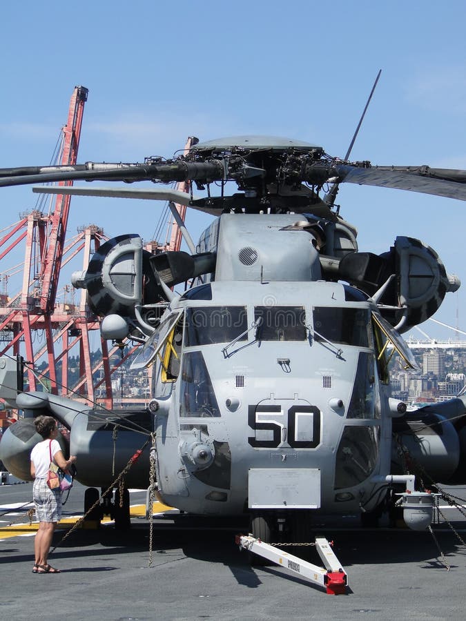 Civilians inspect an CH-53E Sea Stallion