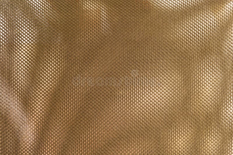 Ciérrese encima de fondo de la textura del tejido de poliester de bronce foto de archivo libre de regalías Ciérrese encima de fondo de la textura del tejido de poliester de bronce foto de archivo libre de regalías