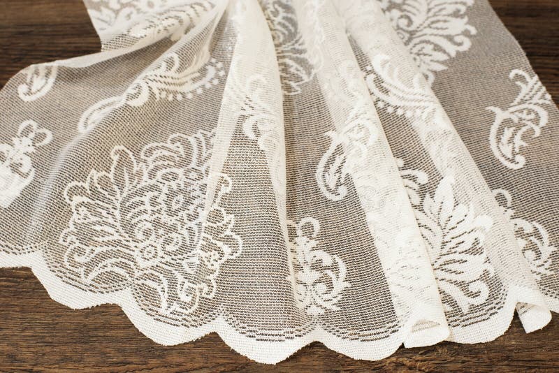 Ciérrese para arriba de Tulle blanca hermosa Muestra escarpada de la tela de las cortinas Textura, fondo, modelo Concepto de la b foto de archivo Ciérrese para arriba de Tulle blanca hermosa Muestra escarpada de la tela de las cortinas Textura, fondo, modelo Concepto de la b foto de archivo