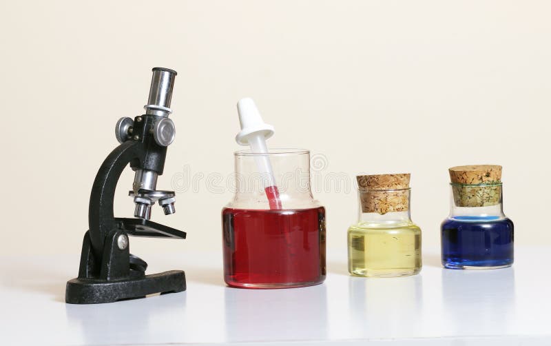 Microscope and coloured liquids. Microscope and coloured liquids