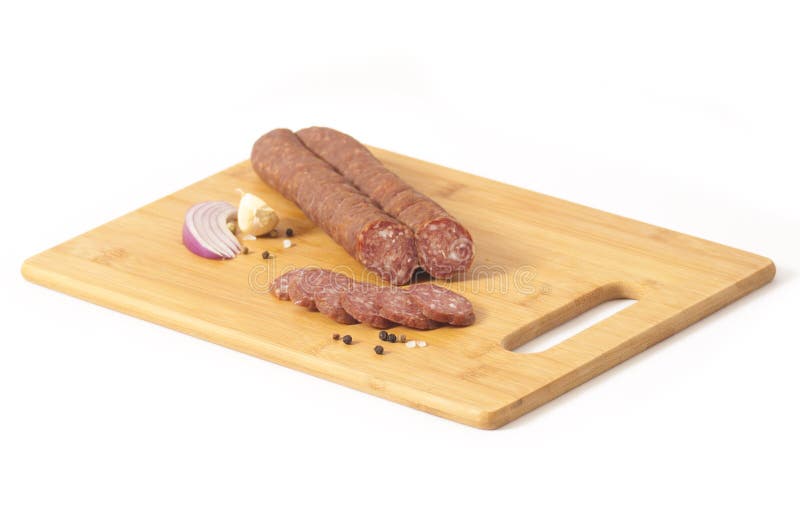 Ciężki salami serba styl Cajna kobasica - Cajna kobasica na białej desce odizolowywającej na białym tle, - fotografia royalty free Ciężki salami serba styl Cajna kobasica - Cajna kobasica na białej desce odizolowywającej na białym tle, - fotografia royalty free