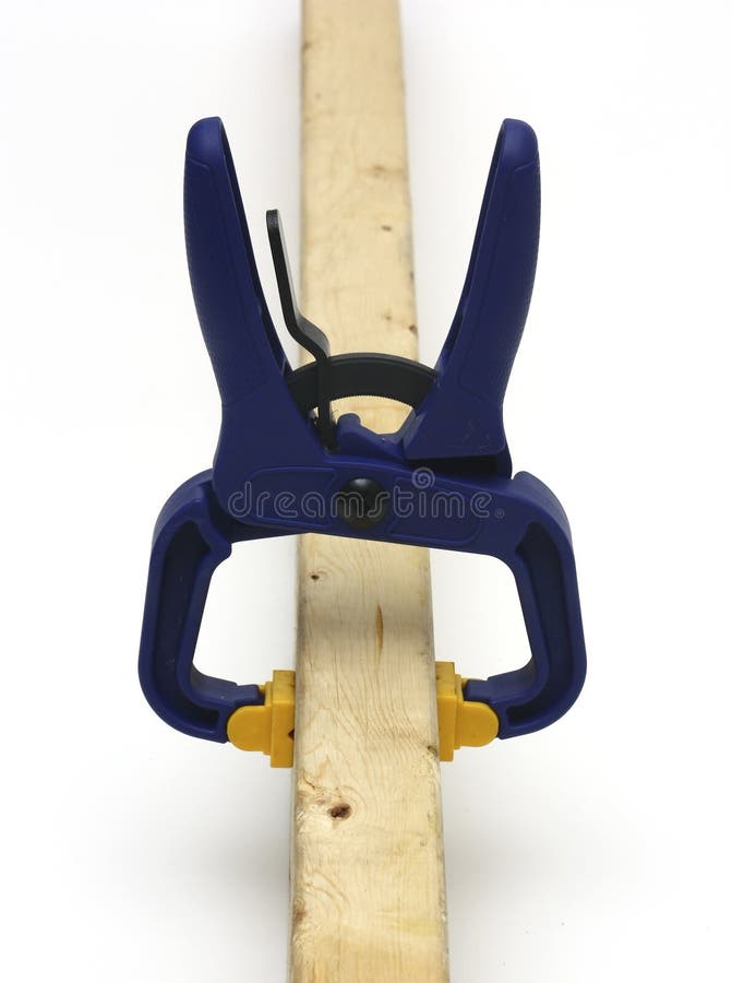 Clamp holding wood stock image. Image of construction 13538307