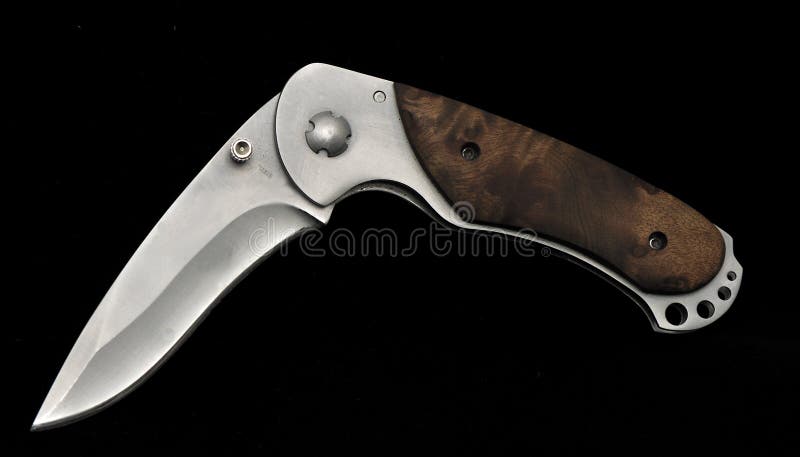 Pocket clasp knife of handle steel on black background. Button clasp stock images, royalty-free photos and pictures