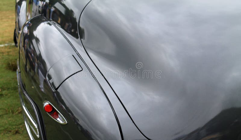 Classic american car rear close up detail of fender and trunk. 1942 buick 51 super sedan. Classic american car rear close up detail of fender and trunk. 1942 buick 51 super sedan.