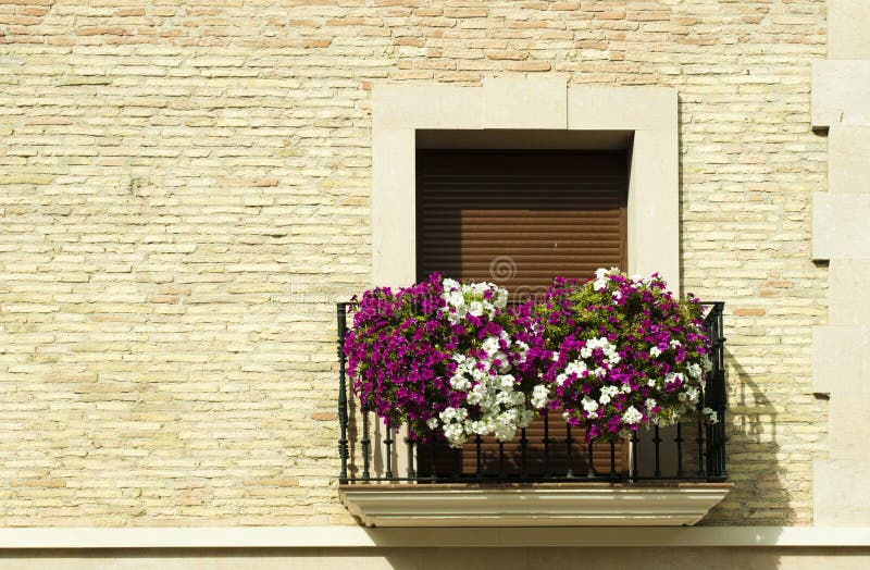 Classic balcony with flowers stock photo Classic balcony with flowers stock photo