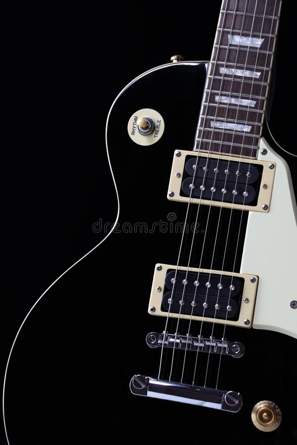 Classic black electric guitar body with white scratchplate stock images Classic black electric guitar body with white scratchplate stock images