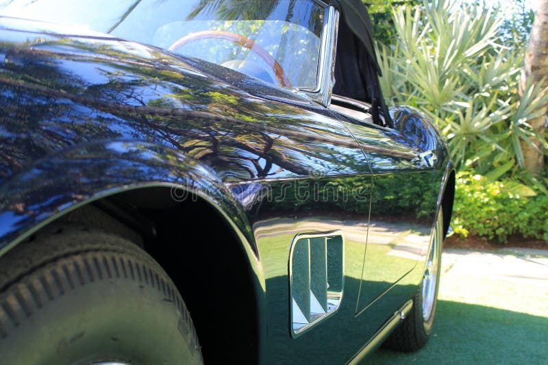 Classic blue italian sports car side detail 2