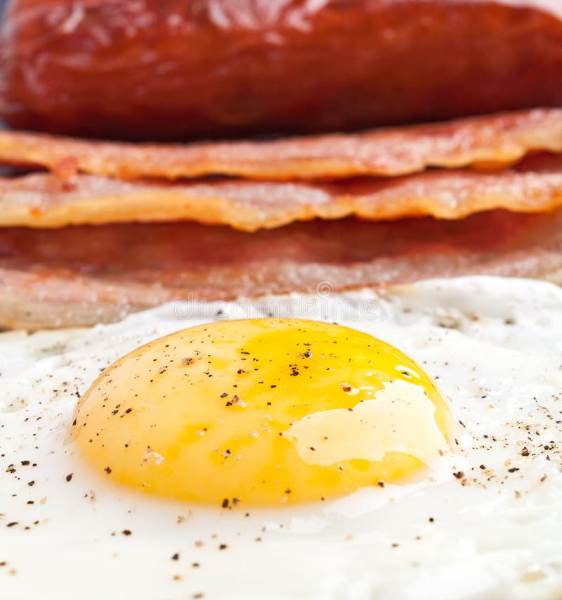 Classic breakfast with fried egg stock photos