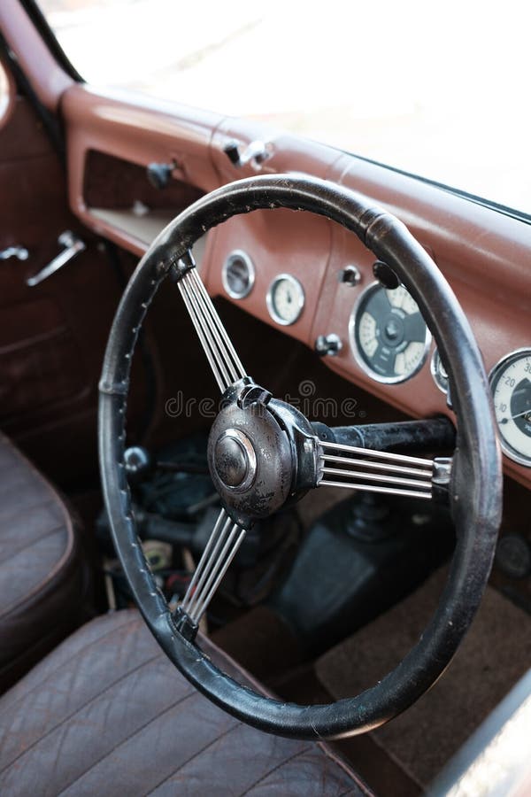 Classic Car with Its Old Steering Wheel, Control Panel, and Dashboard