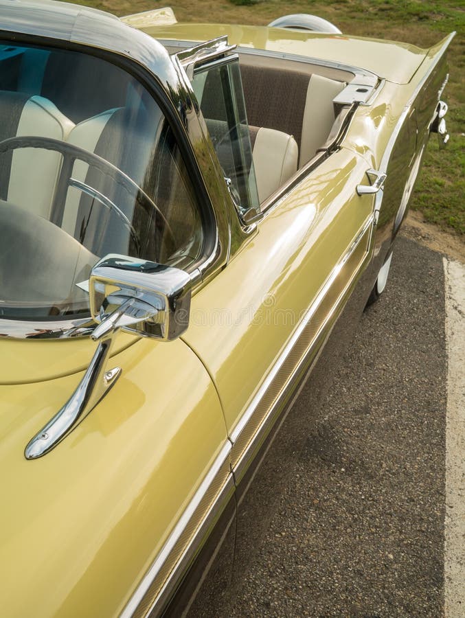 A beautiful vintage hardtop convertible automobile from the 1950s. A beautiful vintage hardtop convertible automobile from the 1950s.