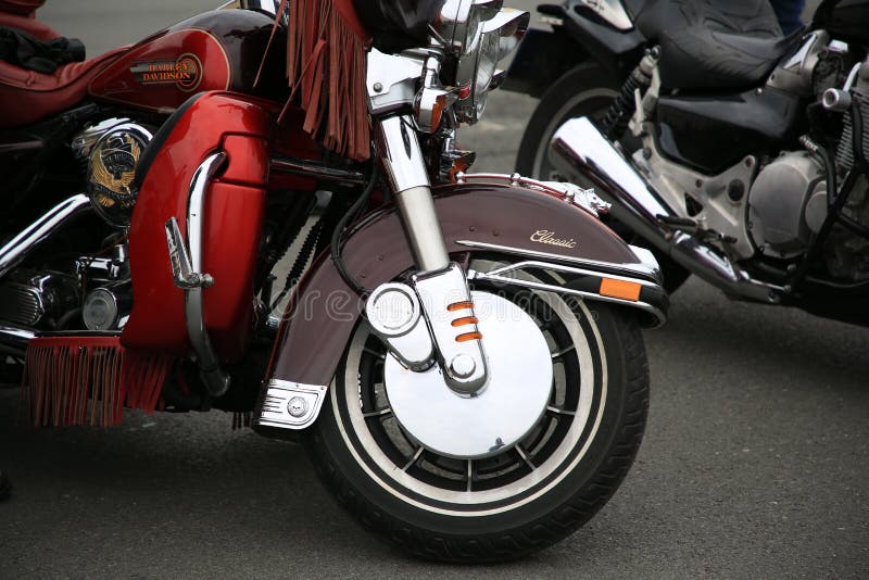 Classic cruiser Harley Davidson motorcycle, side view closeup