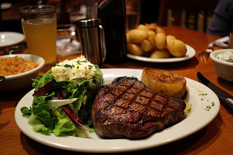 Classic Dinner of Steak, Baked Potato, and Green Salad Stock