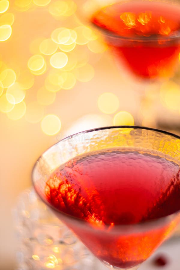 Classic Red Cocktail In Fancy Texture Glass On Bright Light Bokeh