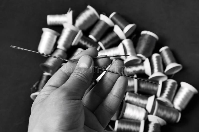988 Hand Holding Sewing Needle Stock Photos Free & RoyaltyFree Stock