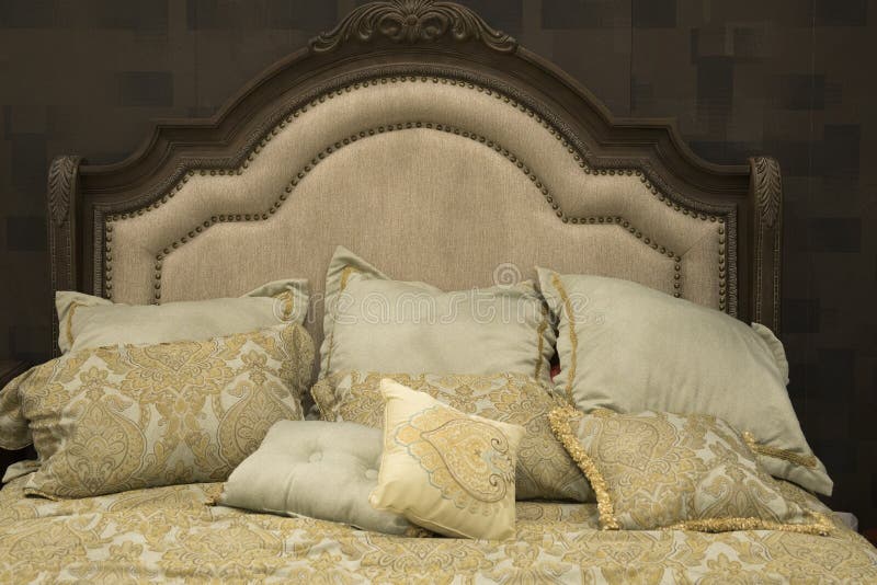 Classic style hotel luxury bed with cozy pillows royalty free stock photo Classic style hotel luxury bed with cozy pillows royalty free stock photo