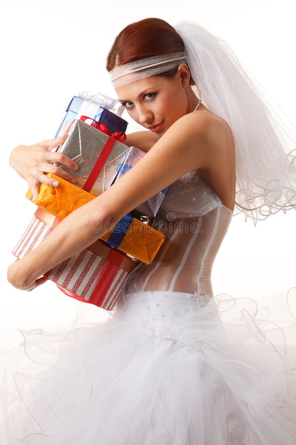 Classical bride with presents royalty free stock photography