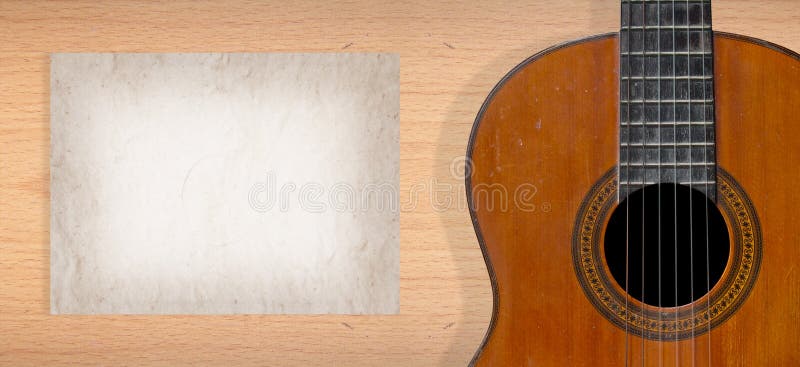 Classical guitar on plywood wall with blank page of mulberry paper for your note. Abstract classical stock images, royalty-free photos and pictures