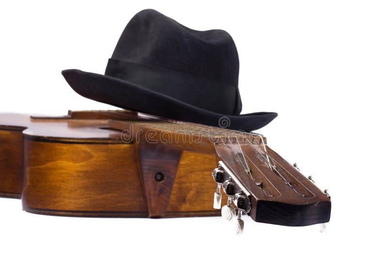 Classical guitar and hat