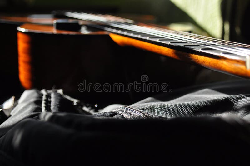 Classical guitar. Issuing a stringed instrument sounds. Fretboard, strings