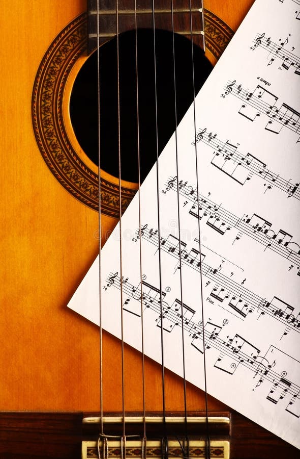 Classical guitar and notes stock image. Image of guitarist 39185797