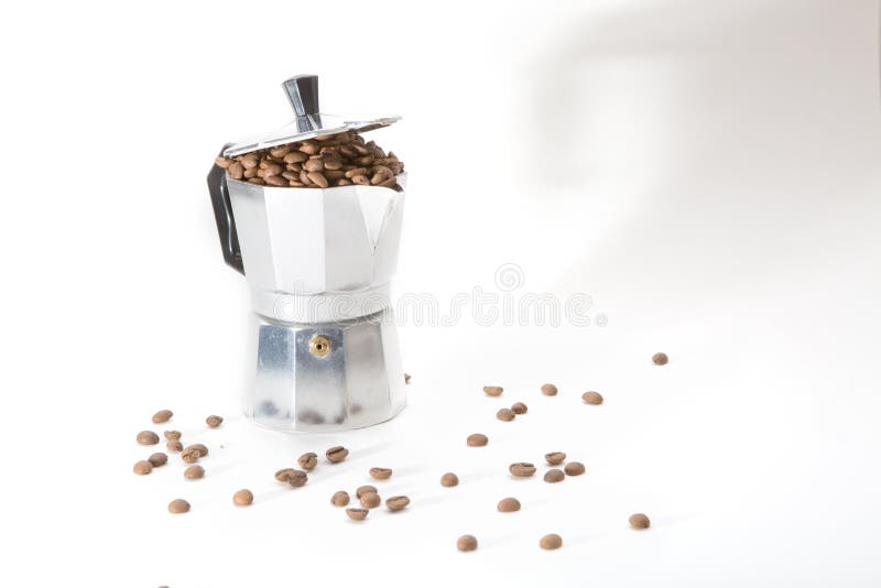 Classical Italian Coffee Maker Pot Filled with Coffee Beans Stock Image