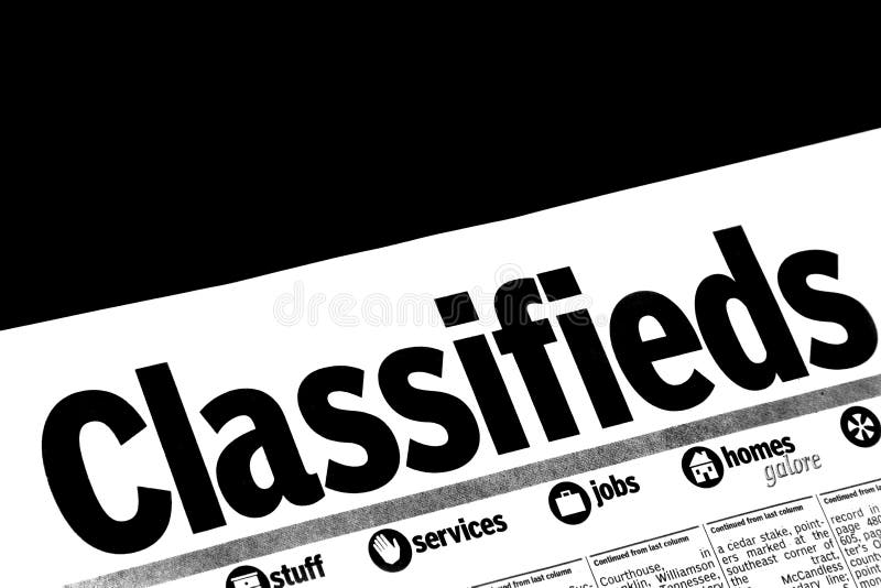 CLASSIFIEDS section of the newspaper royalty free stock photo