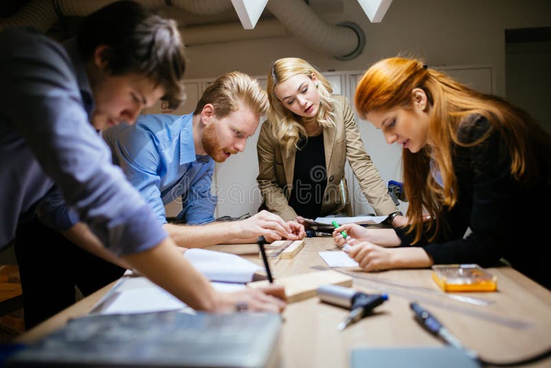 Classmates Working on a Project Together Stock Photo - Image of ...