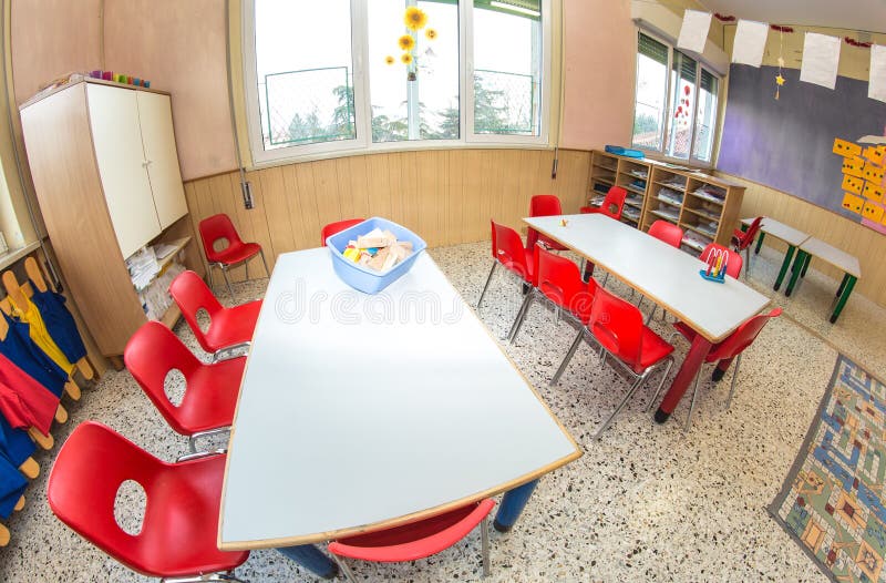 Classroom Nursery with Chairs and Desks for Children Stock Photo