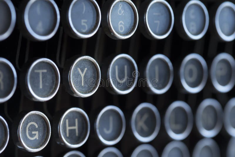 Keyboard placed on retro typewriter. Horizontal indoors shot. Keyboard placed on retro typewriter. Horizontal indoors shot