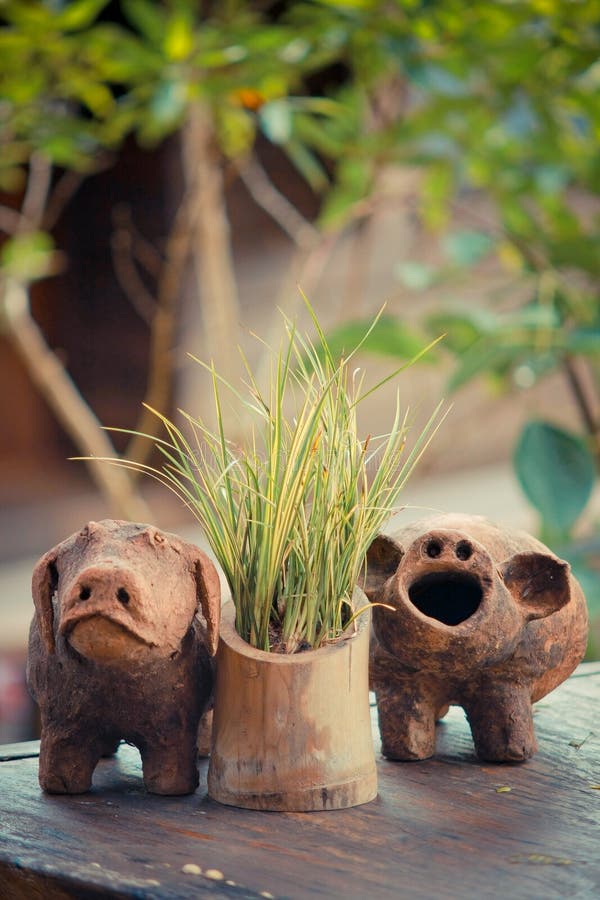Clay pig decorating garden stock image. Image of craft 30471779