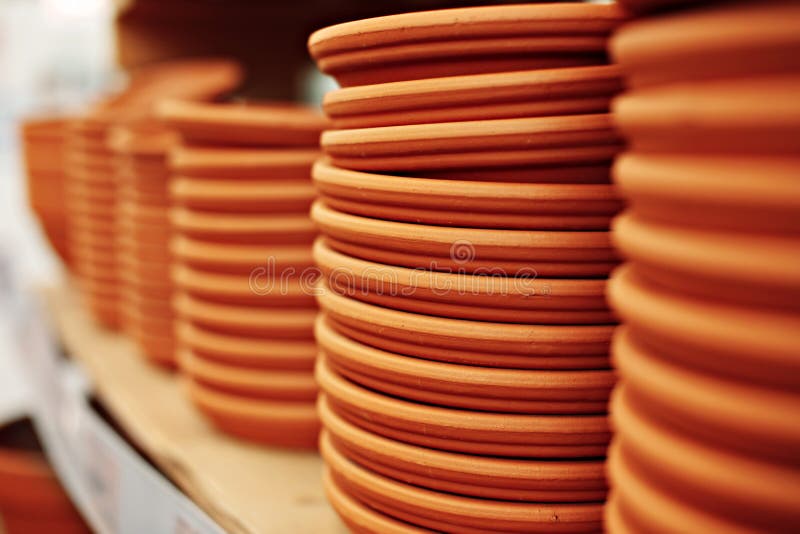 Clay plates stack stock image. Image of traditional 150082155
