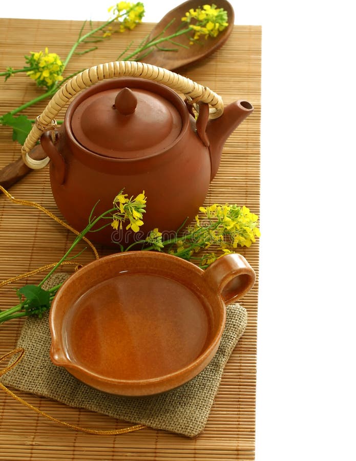 Exposition of Hand Made Clay Set on White Wooden Table with Tasty