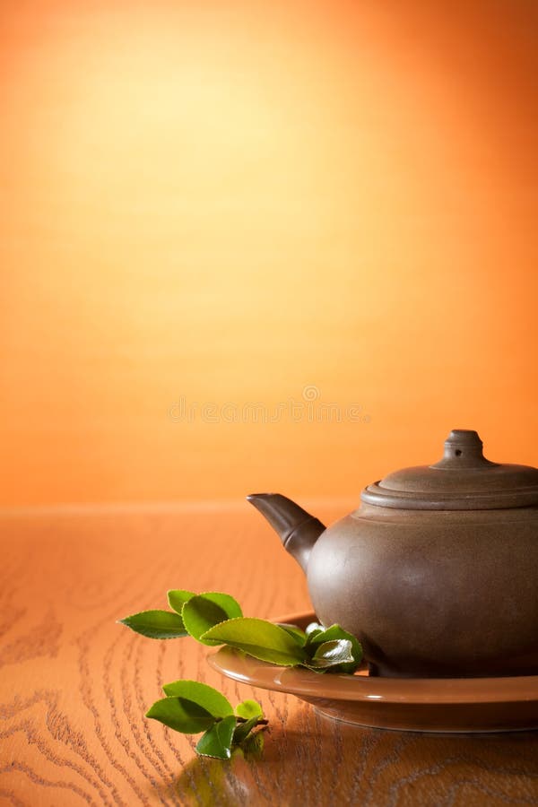 Clay teapot with greean tea