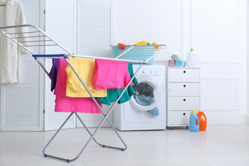 Clean Bright Laundry Hanging on Drying Rack Indoors Stock Photo Image