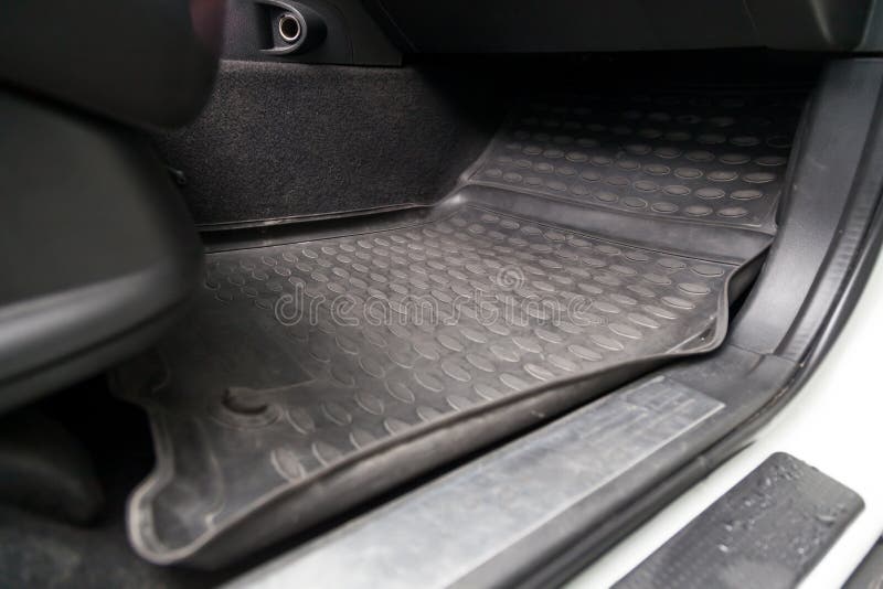 Clean Car Floor Mats Of Black Rubber Under Front Passenger Seat In