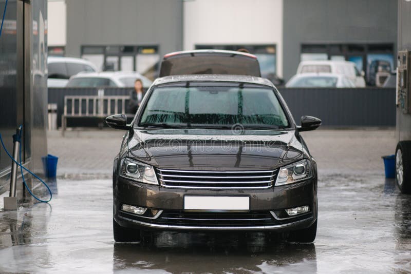 Clean Car on Self Car Washing. Wet Car after Washing Stock Photo