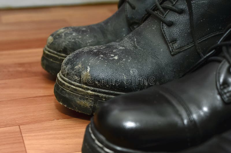 Clean and Dirty Black Shoes on the Floor, Close-up Stock Photo - Image ...